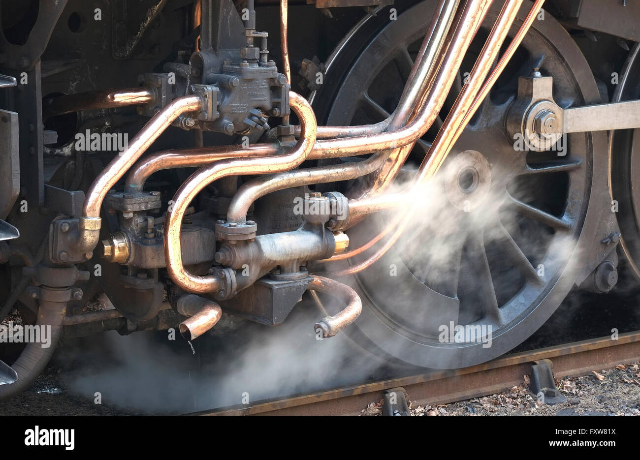copper pipes on old steam railway train engine Stock Photo Alamy