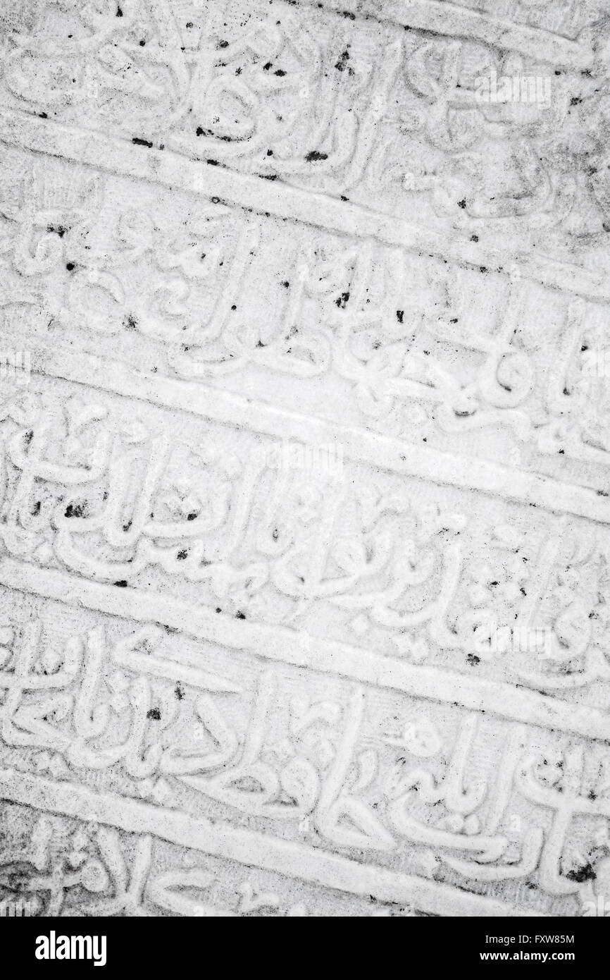 Ancient white headstone fragment with Arabic script carving. Smyrna, Izmir, Turkey Stock Photo
