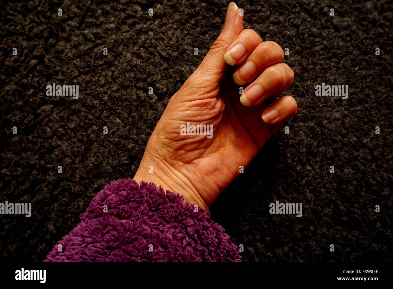 Ageing hand has developed a texture all of its own Stock Photo