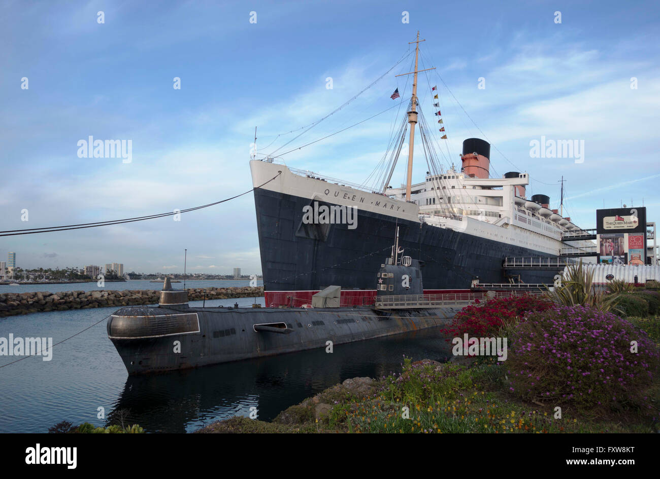 The Queen Mary docked at Longbeach California with the Russian submarine in the foreground Stock Photo
