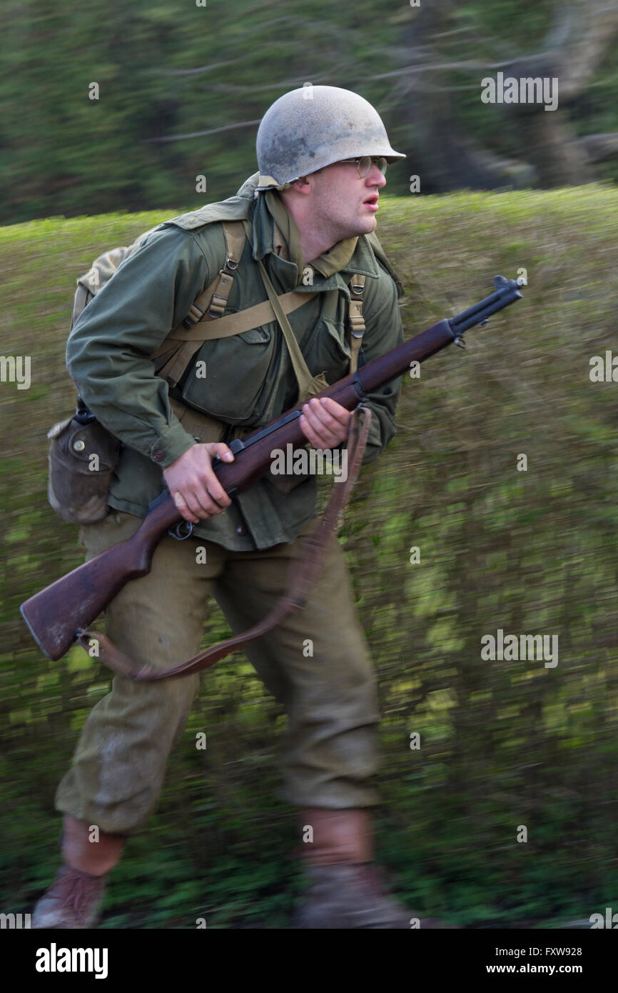 American soldier advancing on the battlefield Stock Photo