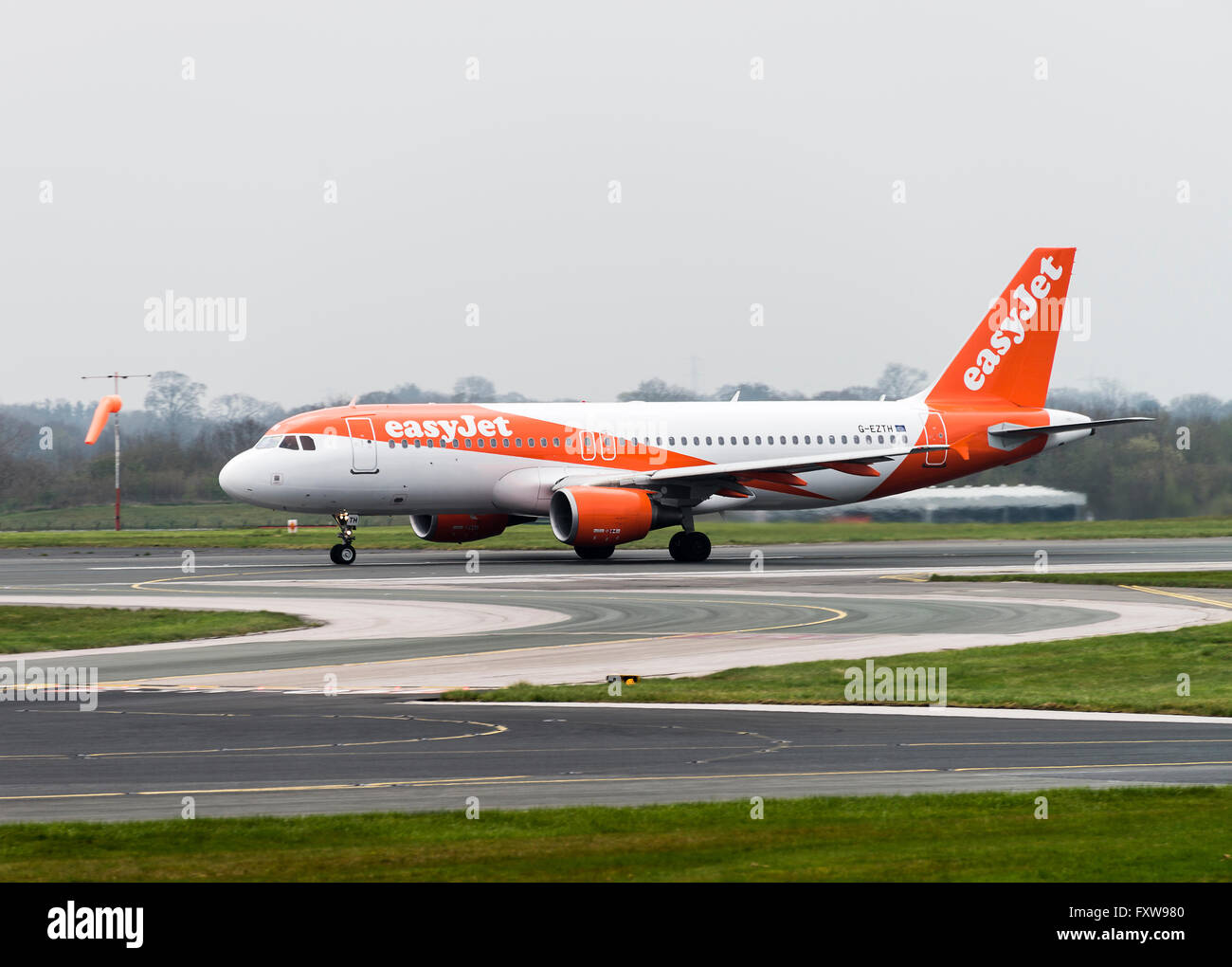 EasyJet Airline Airbus A320-214 Airliner G-EZTH Taking Off at Manchester International Airport England United Kingdom UK Stock Photo
