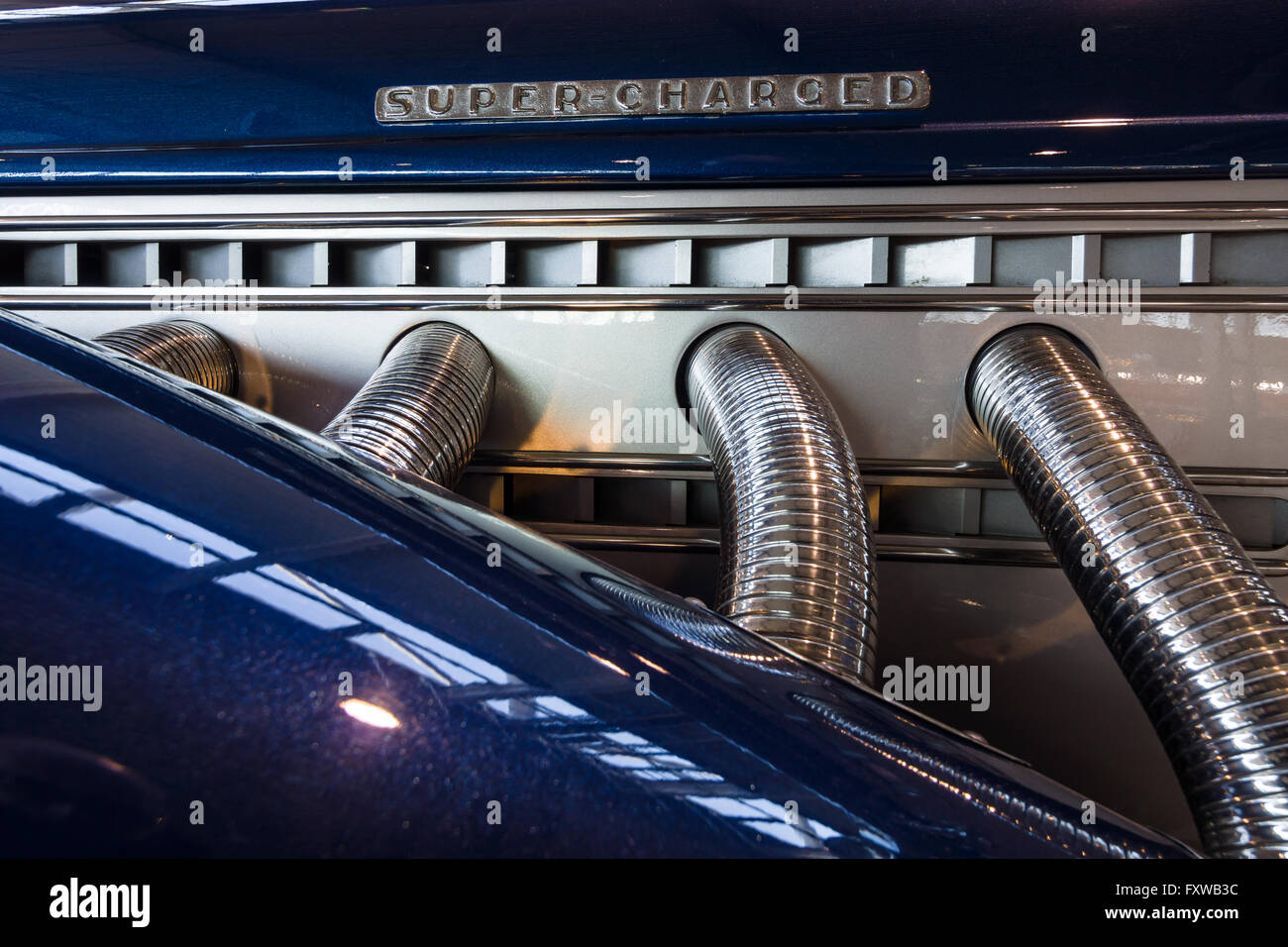 Exhaust system of luxury car Auburn Duesenberg Model SJ Cabrio. Stock Photo