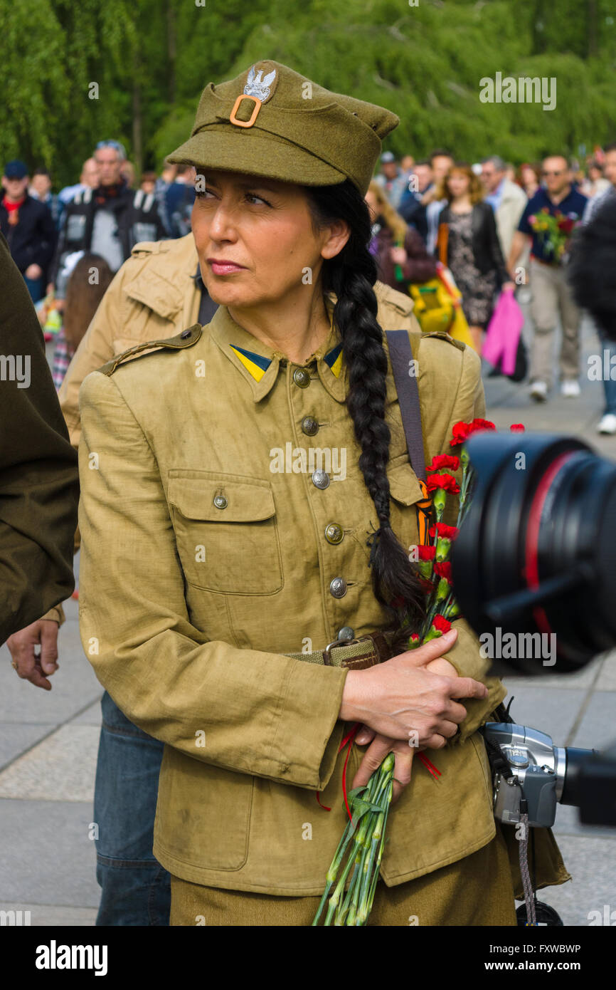 BERLIN - MAY 09, 2015: Victory Day in Treptower Park. The woman officer in the uniform of the Polish Army during the war. Stock Photo