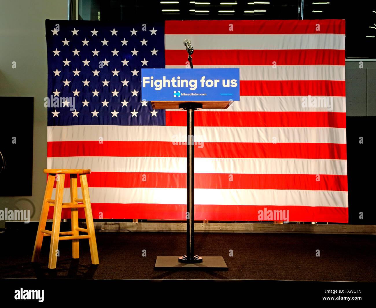 Empty Podium reads 'Fighting For US' at Hillary Clinton Rally at SW College Los Angeles, April 16, 2016 Stock Photo