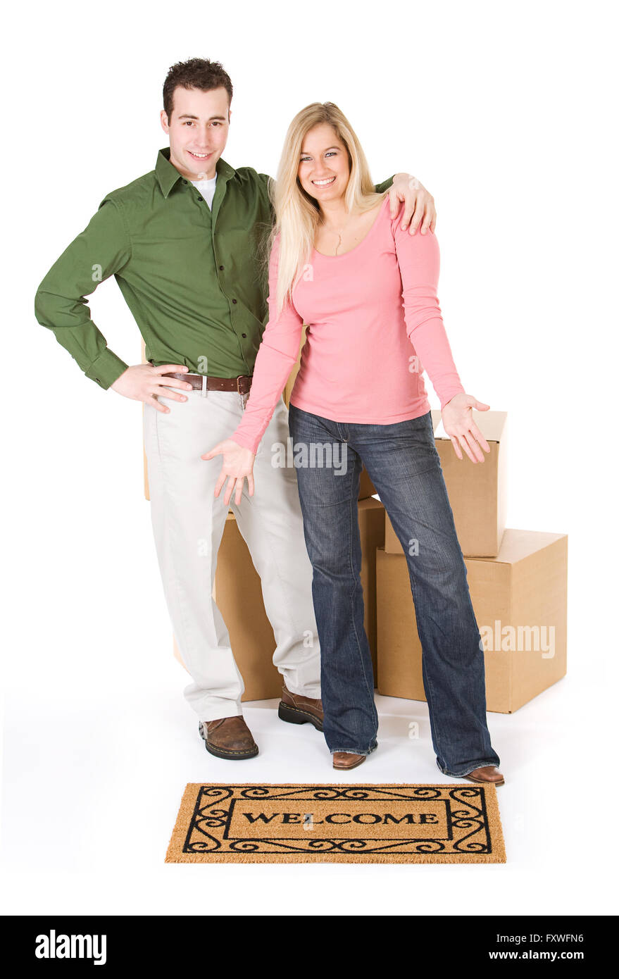 Young couple in a moving/relocation theme, isolated on white. Stock Photo