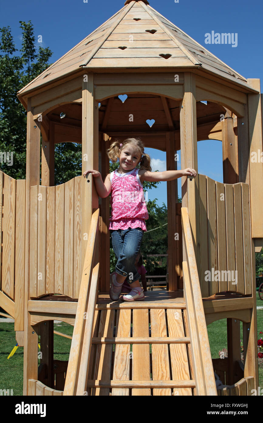 happy little girl on playground Stock Photo - Alamy