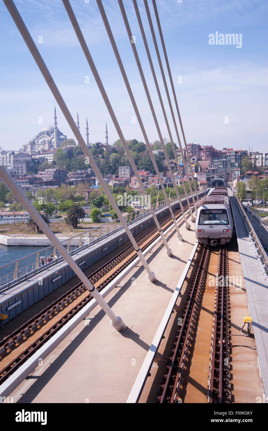 The new metro bridge took many years to construct and now crosses the Golden Horn in Istanbul Stock Photo