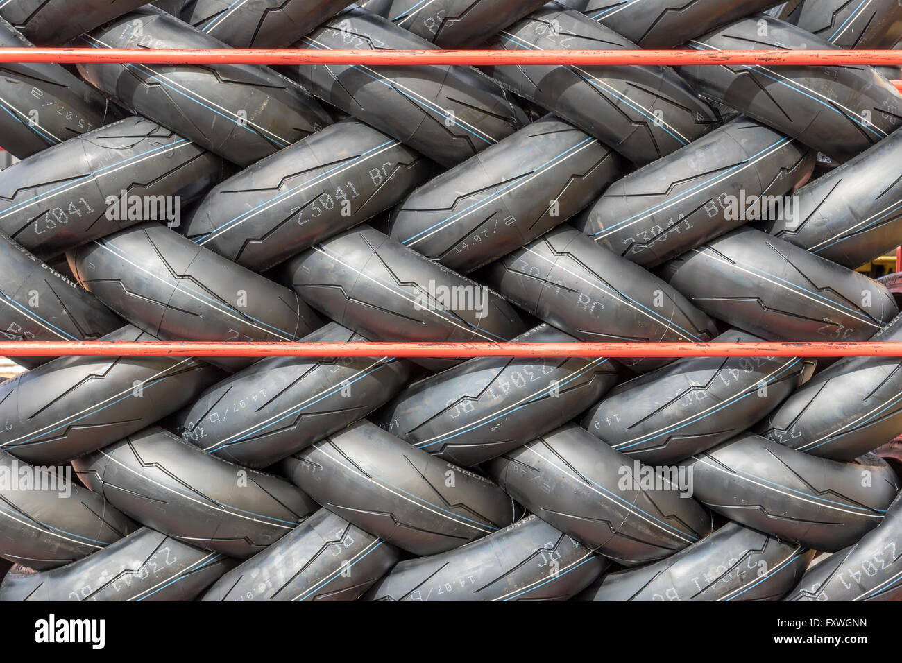 A rack of Pirelli Diablo Supercorsa motorcycle racing tires Stock Photo