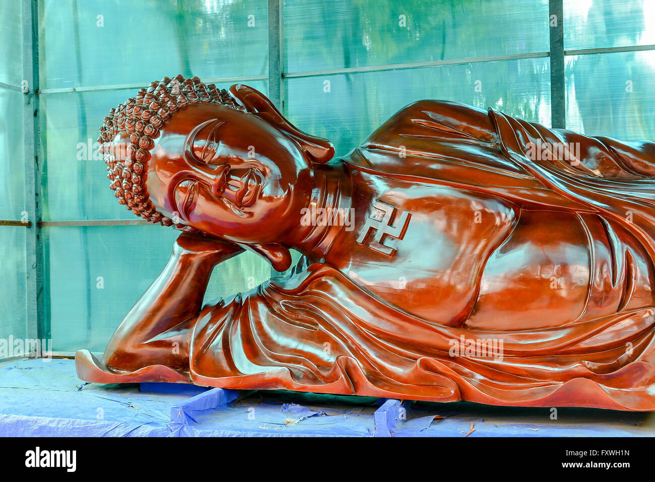 Giant Wooden Carving of the Buddha - Da Lat, Vietnam Stock Photo