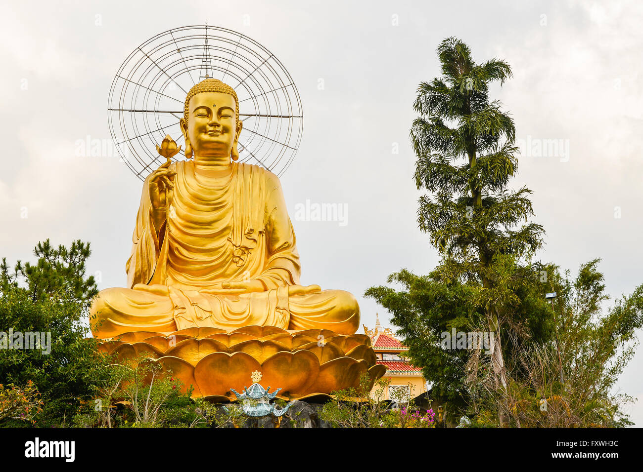 Giant Golden Buddha at Van Hanh Pagoda Compound - Da Lat, Vietnam Stock Photo