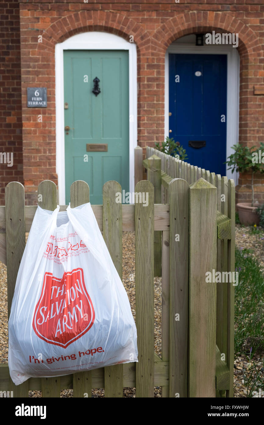 The Salvation Army charity bag waiting collection, Bawdsey, Suffolk, UK. Stock Photo