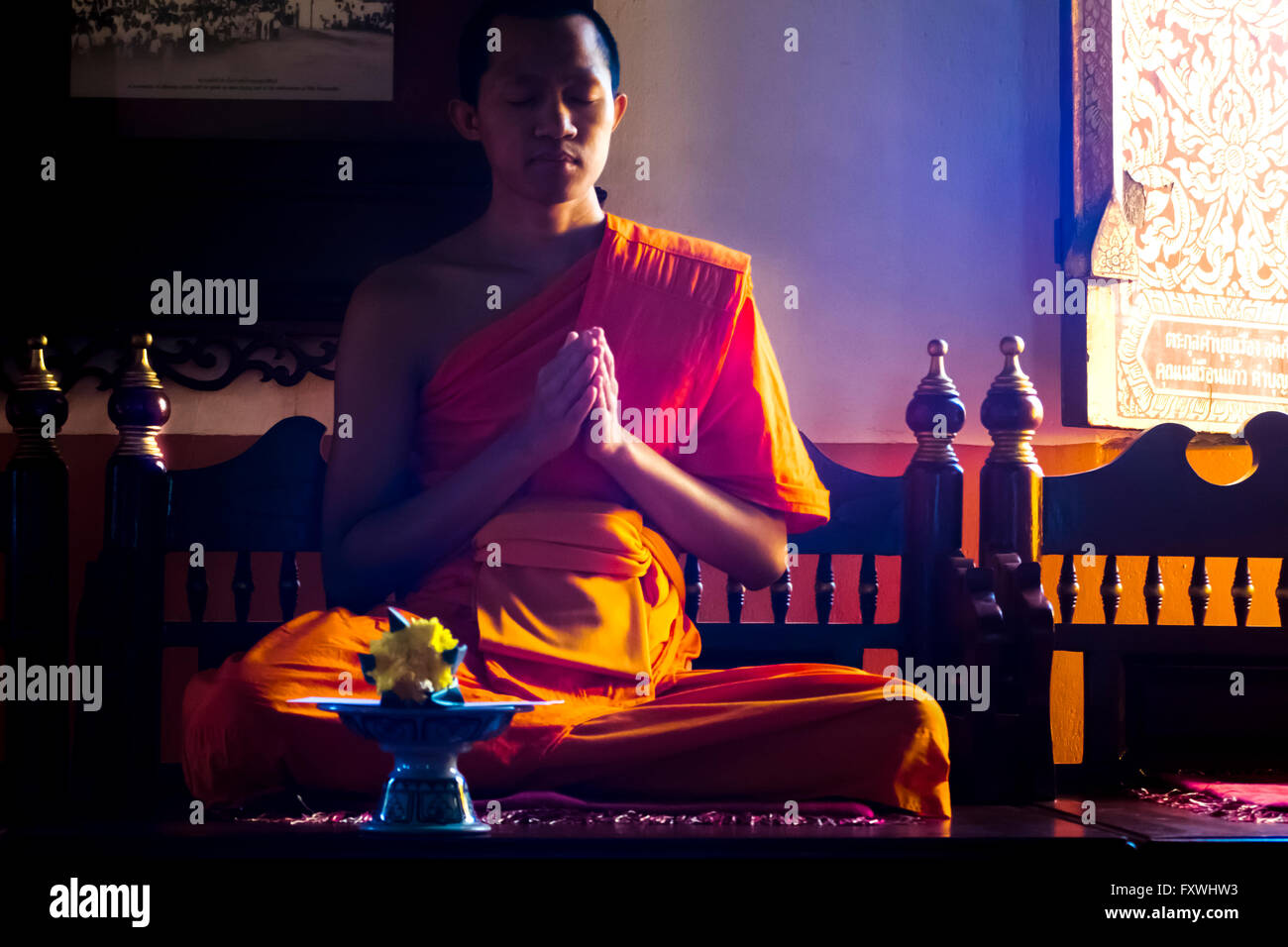 Buddhist monk praying hands hi-res stock photography and images - Alamy