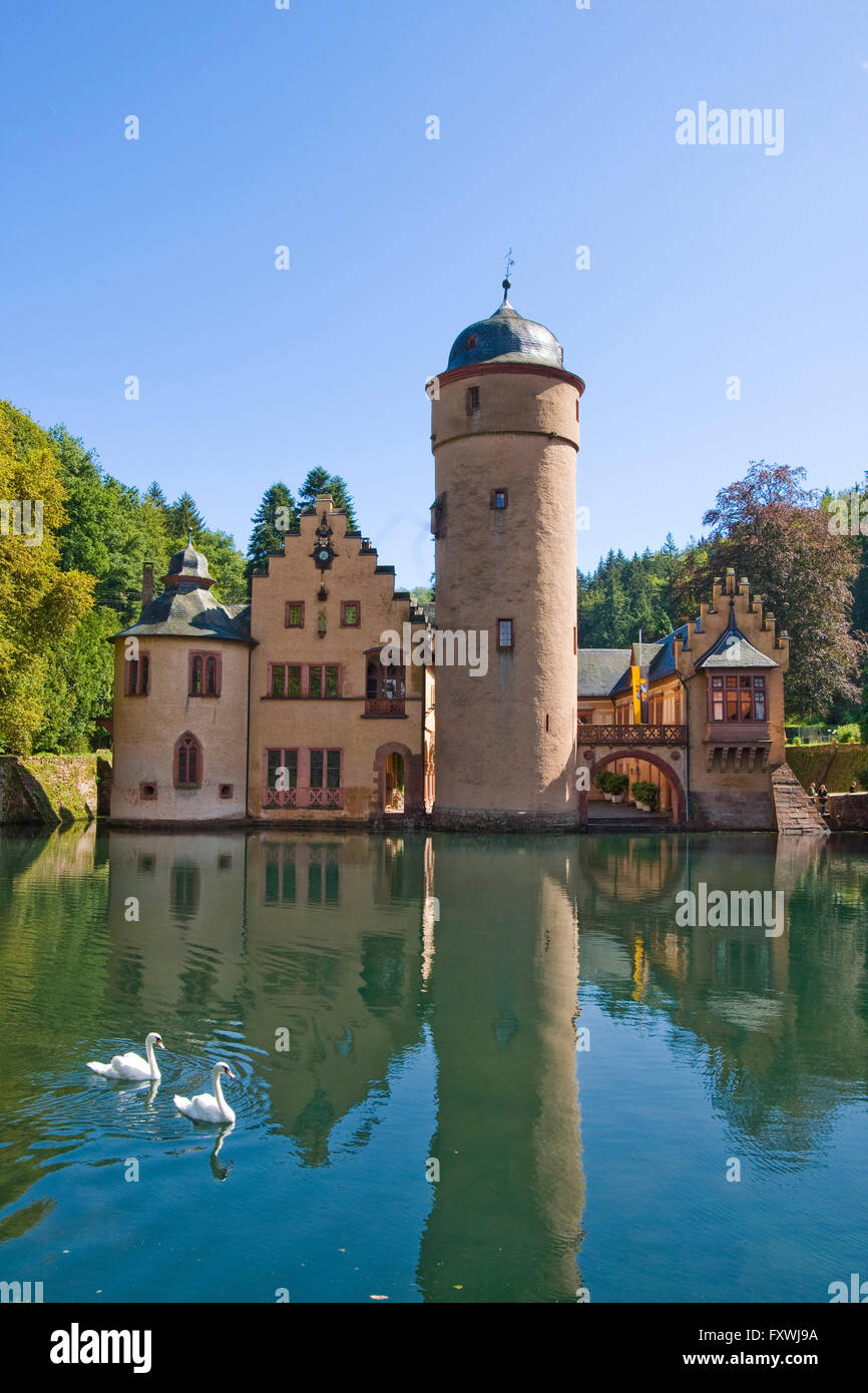 The moated castle Mespelbrunn lies in an isolated side valley of the Elsava valley in the Spessart, Bavaria, Germany. Stock Photo