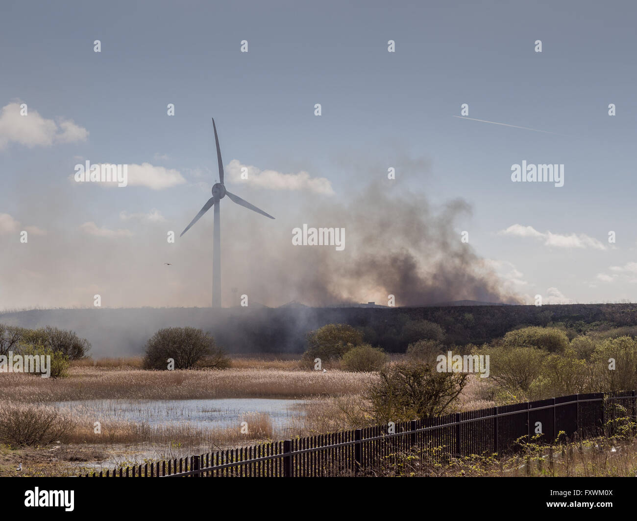 Fleetwood, Lancashire, UK. April 17th 2016. Heavy acrid smoke and polution caused by the Plastic waste fire at Fleetwood on Saturday Credit:  Sue Burton/Alamy Live News Stock Photo