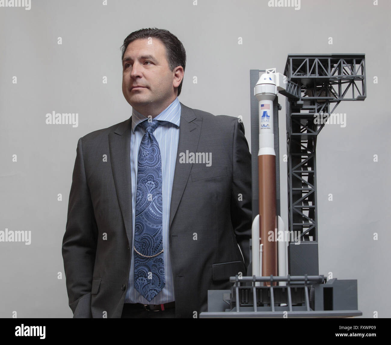Colorado Springs, Colorado, USA. 12th Apr, 2016. Gary L. Wentz is vice president, Human Launch Services for United Launch Alliance (ULA) stands for a photograph with a model of the Atlas V at the 32nd Space Symposium in Colorado Springs, Colorado, U.S., on Tuesday, April 12, 2016. © Matthew Staver/ZUMA Wire/Alamy Live News Stock Photo