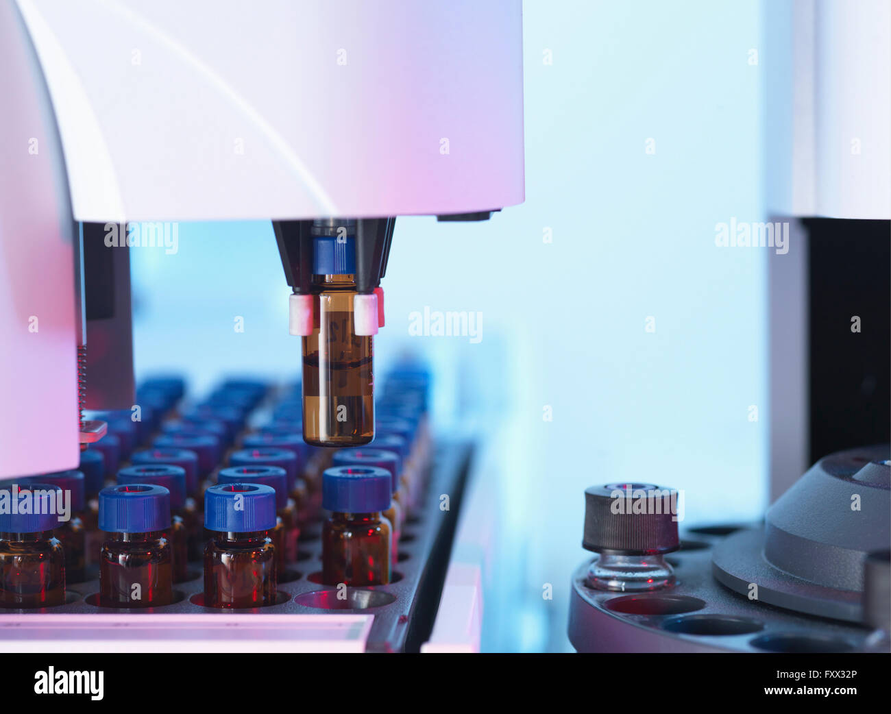 Gas chromatography separating vials of complex compound mixtures into individual components Stock Photo