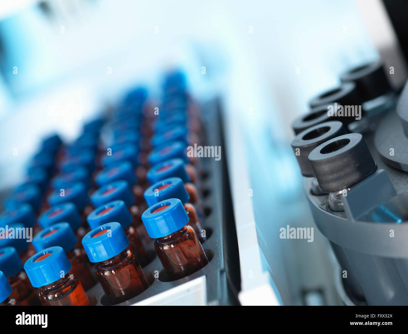 Gas chromatography separating vials of complex compound mixtures into individual components Stock Photo