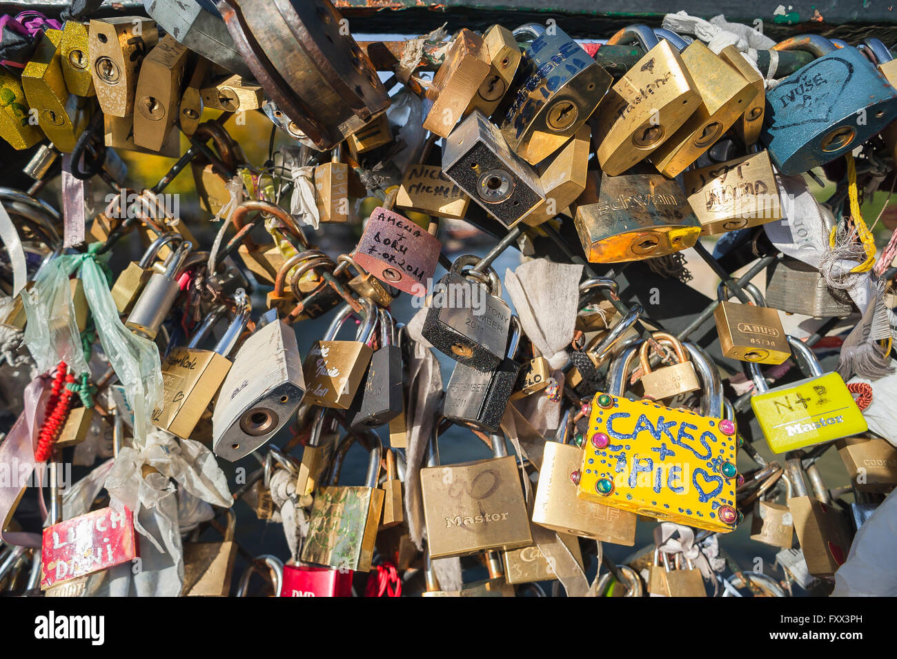 France romance, close-up detail of love locks attached to the Pont de l'Archeveche, a bridge across the River Seine in the centre of Paris, France. Stock Photo
