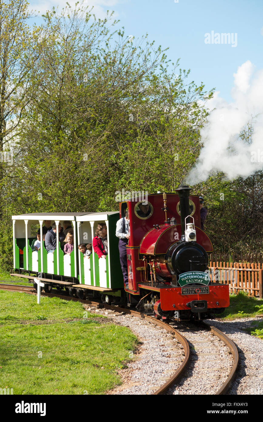 Miniature / model narrow gauge railway steam train at the