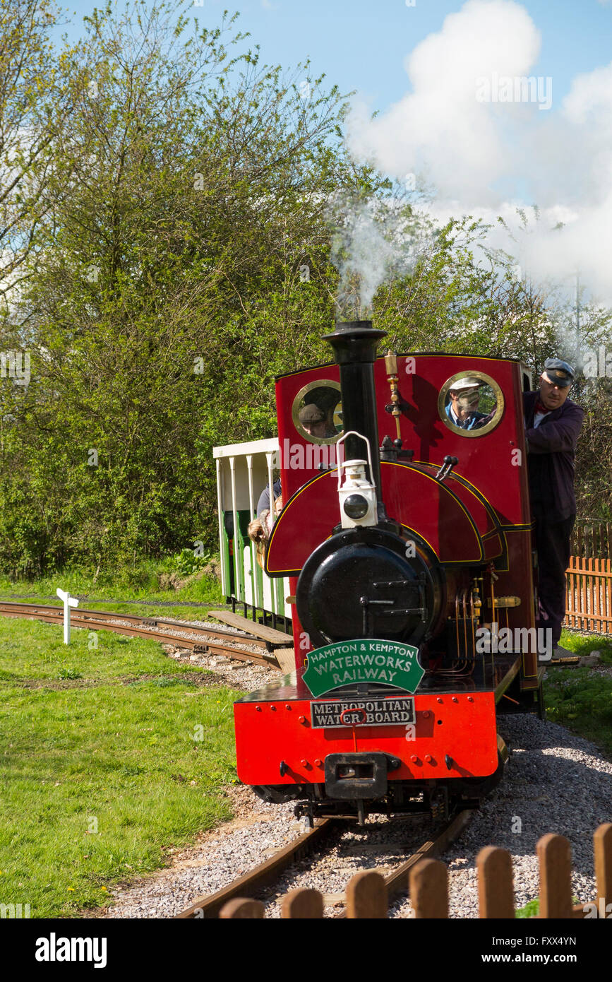 Miniature / model narrow gauge railway steam train at the