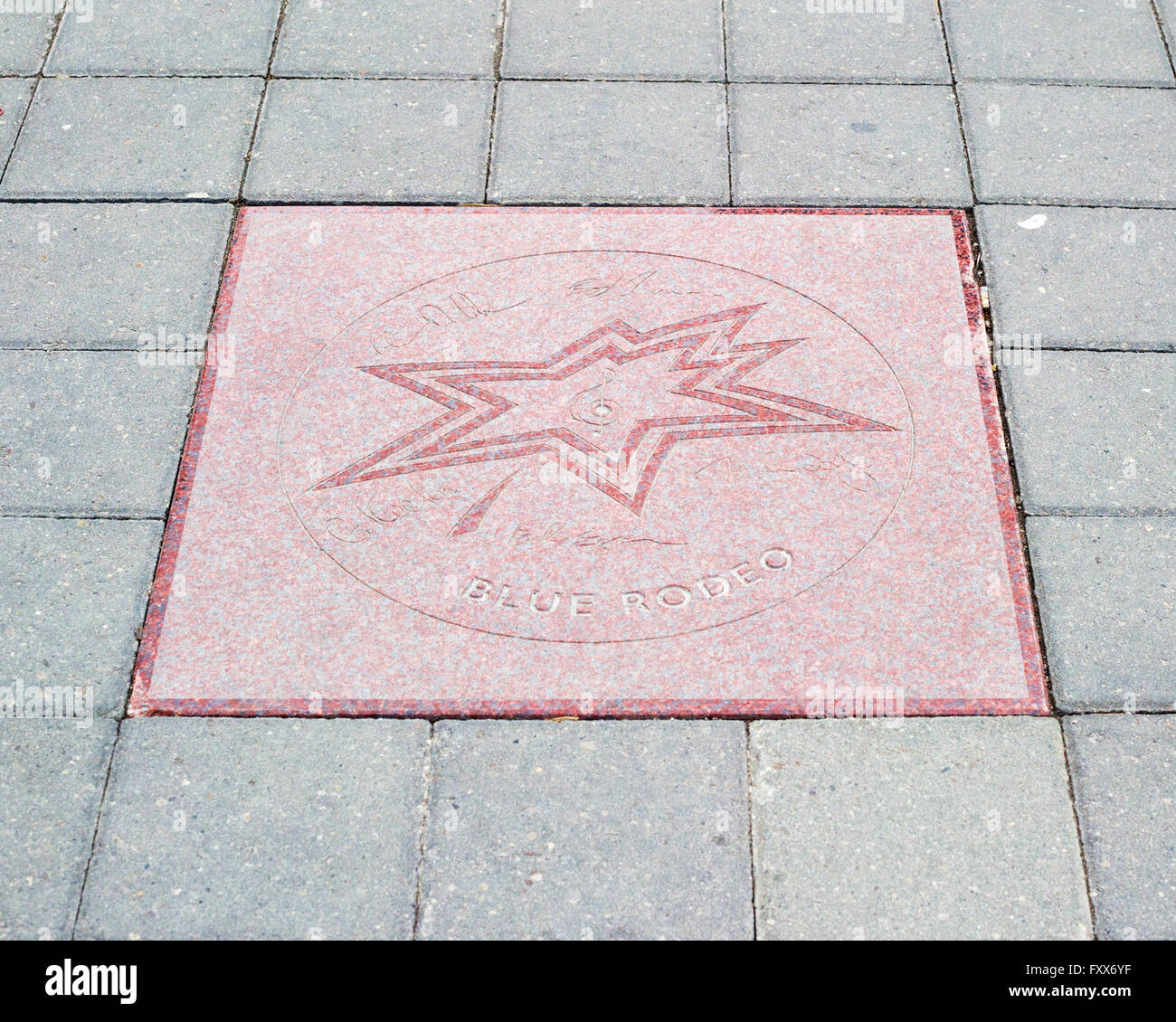 Canada's Walk of Fame, sidewalk star in the shape of a stylized maple leaf to acknowledge accomplishments of Blue Rodeo Stock Photo