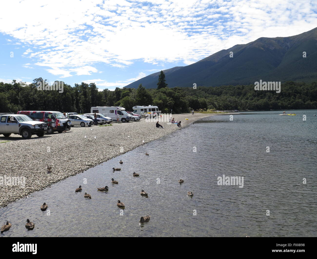 Cars overlooking Lake Rotoiti, Nelson Lakes National Park, New Zealand Stock Photo