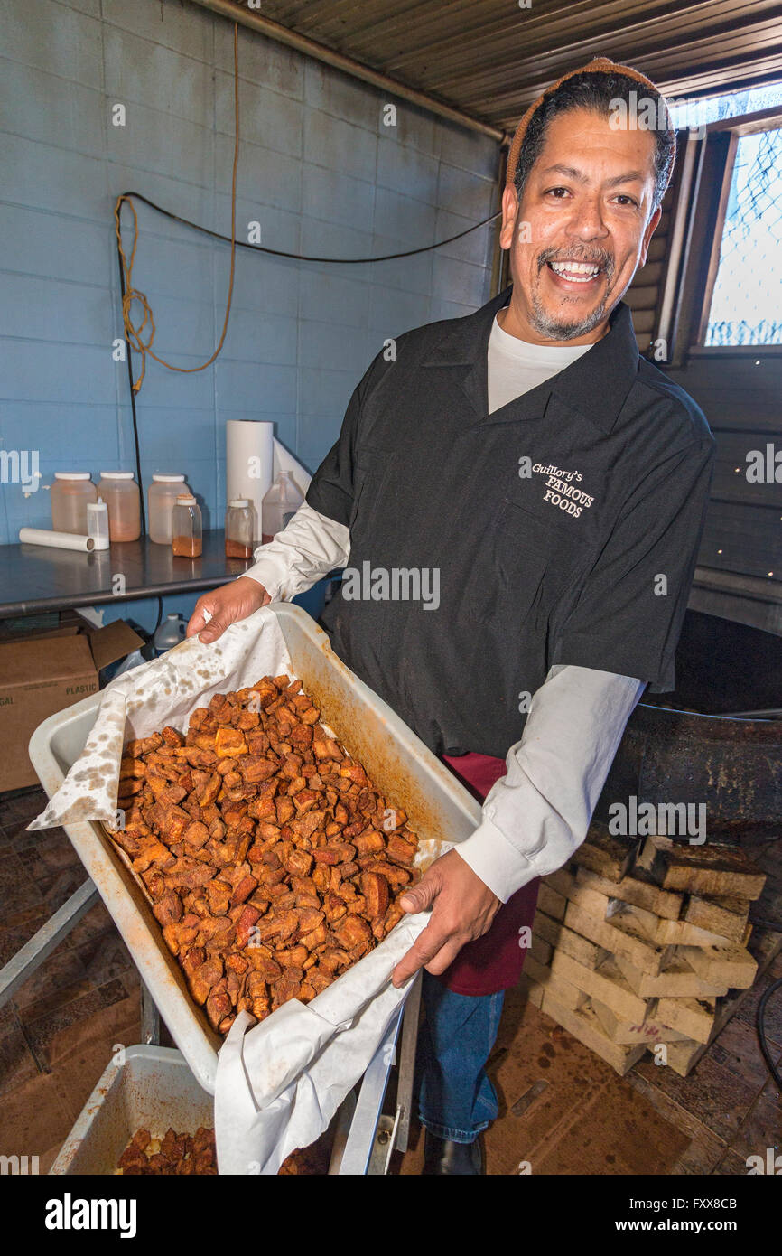 Darby Guillory with a fresh made batch of his famous cracklins...deep