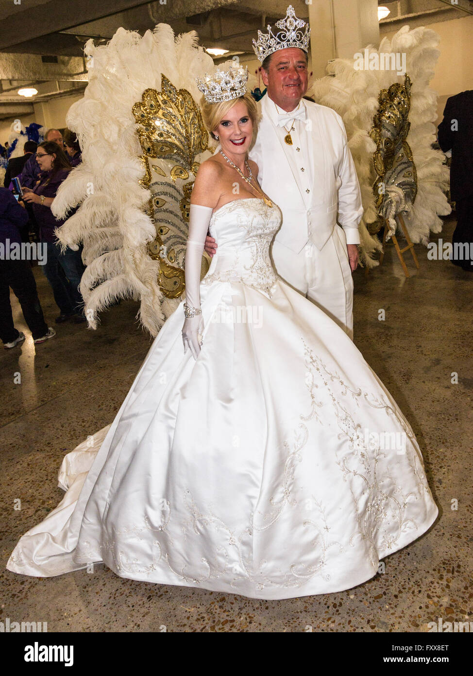 Two Of The Krewe Revelers From Krewe Du Lac Getting Ready For A