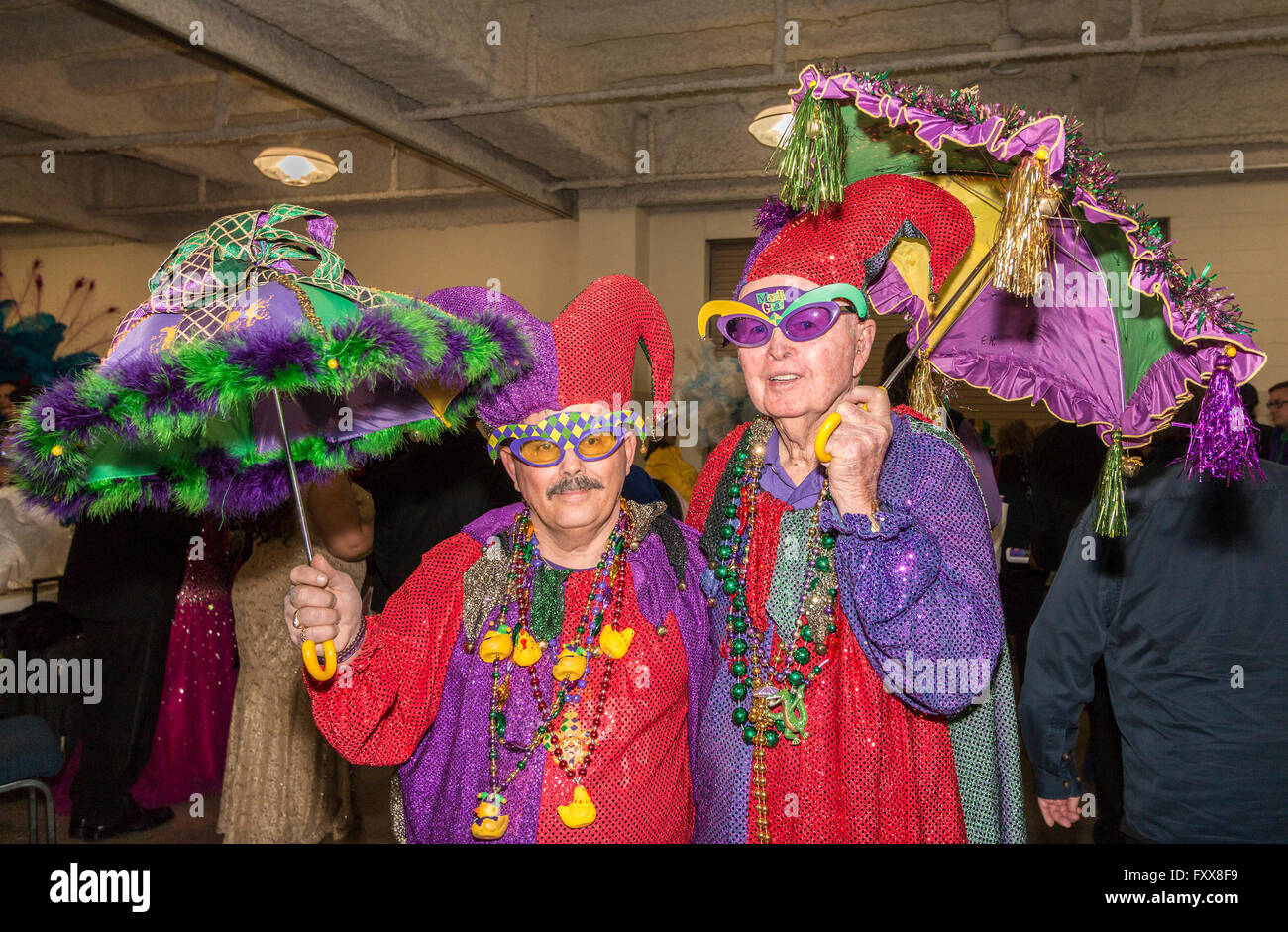Two of the krewe revelers from the 12th Night Revelers, getting ready