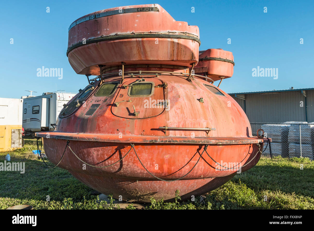 Metal lifeboat capsule used by the offshore drilling industry. Stock Photo