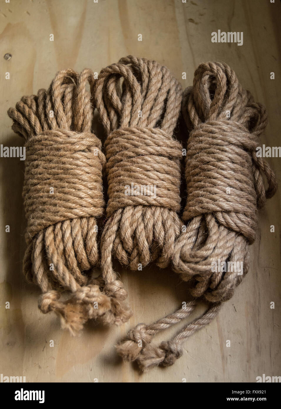 Three coiled ropes Stock Photo - Alamy