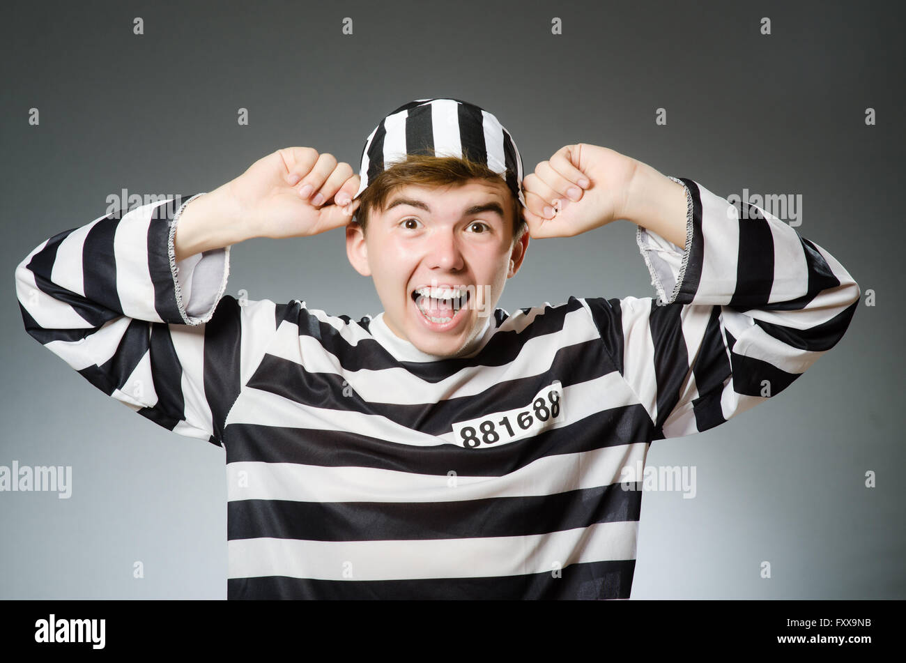 Funny prisoner in prison concept Stock Photo Alamy