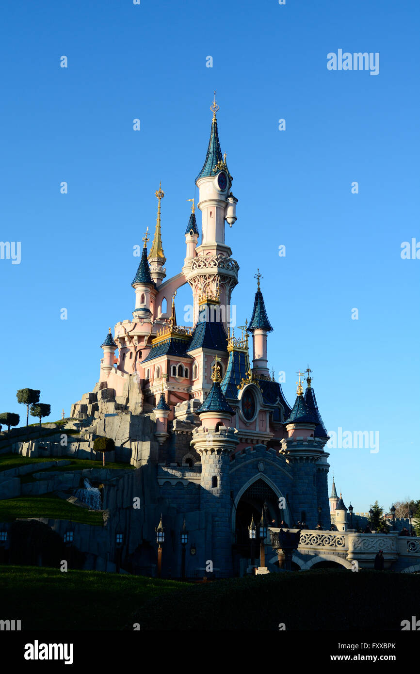 Cinderellas Castle at Disneyland Paris France - blue sky and sunlit Stock Photo