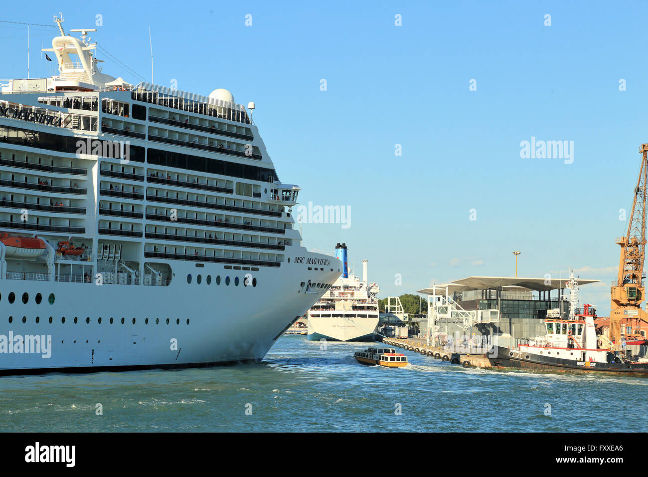 Marittima Cruise Terminal. Cruise ship MSC Magnifica entering the port of Venice, Italy Stock Photo