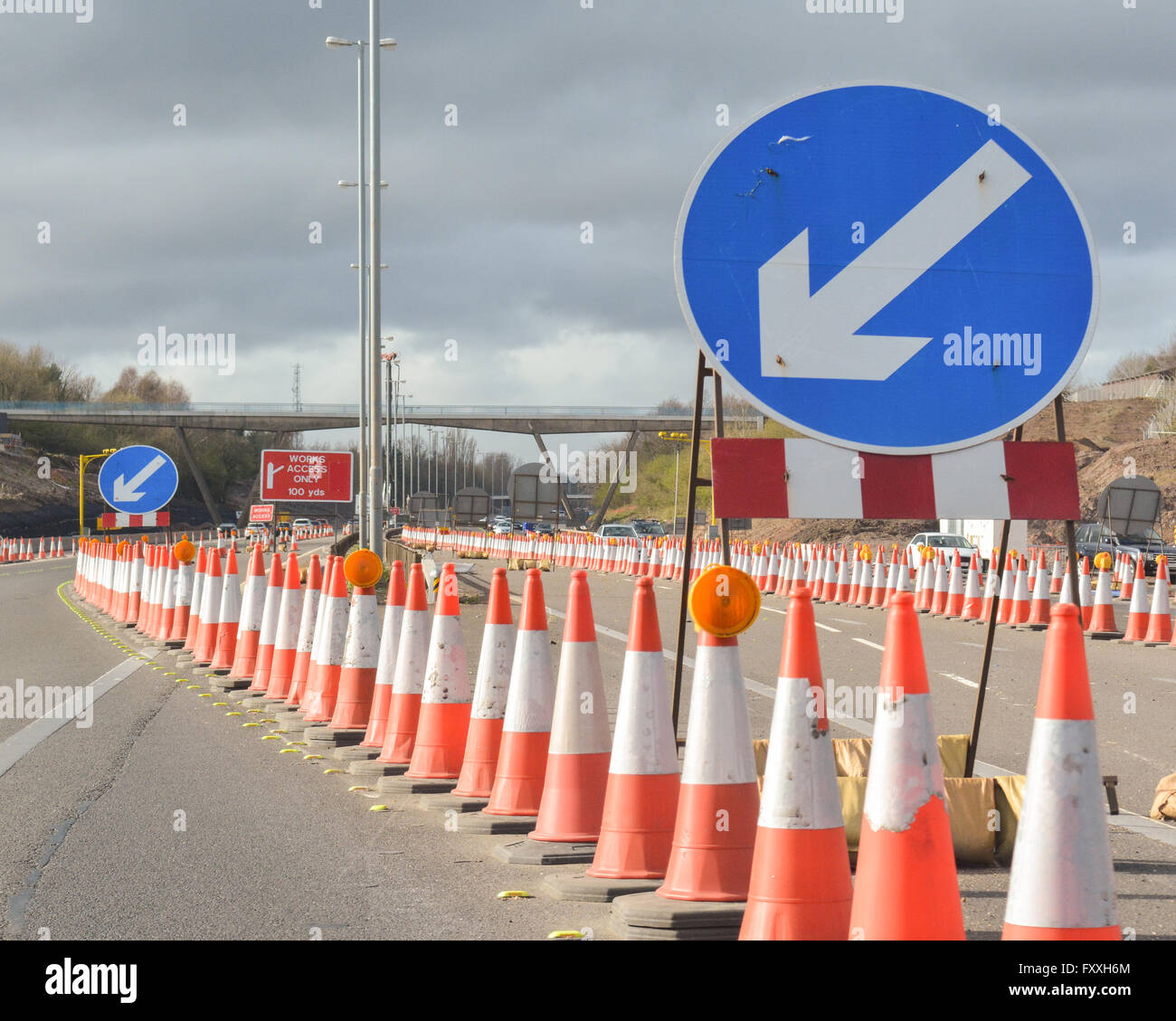 roadworks cones traffic signs for contraflow system on uk motorway Stock Photo