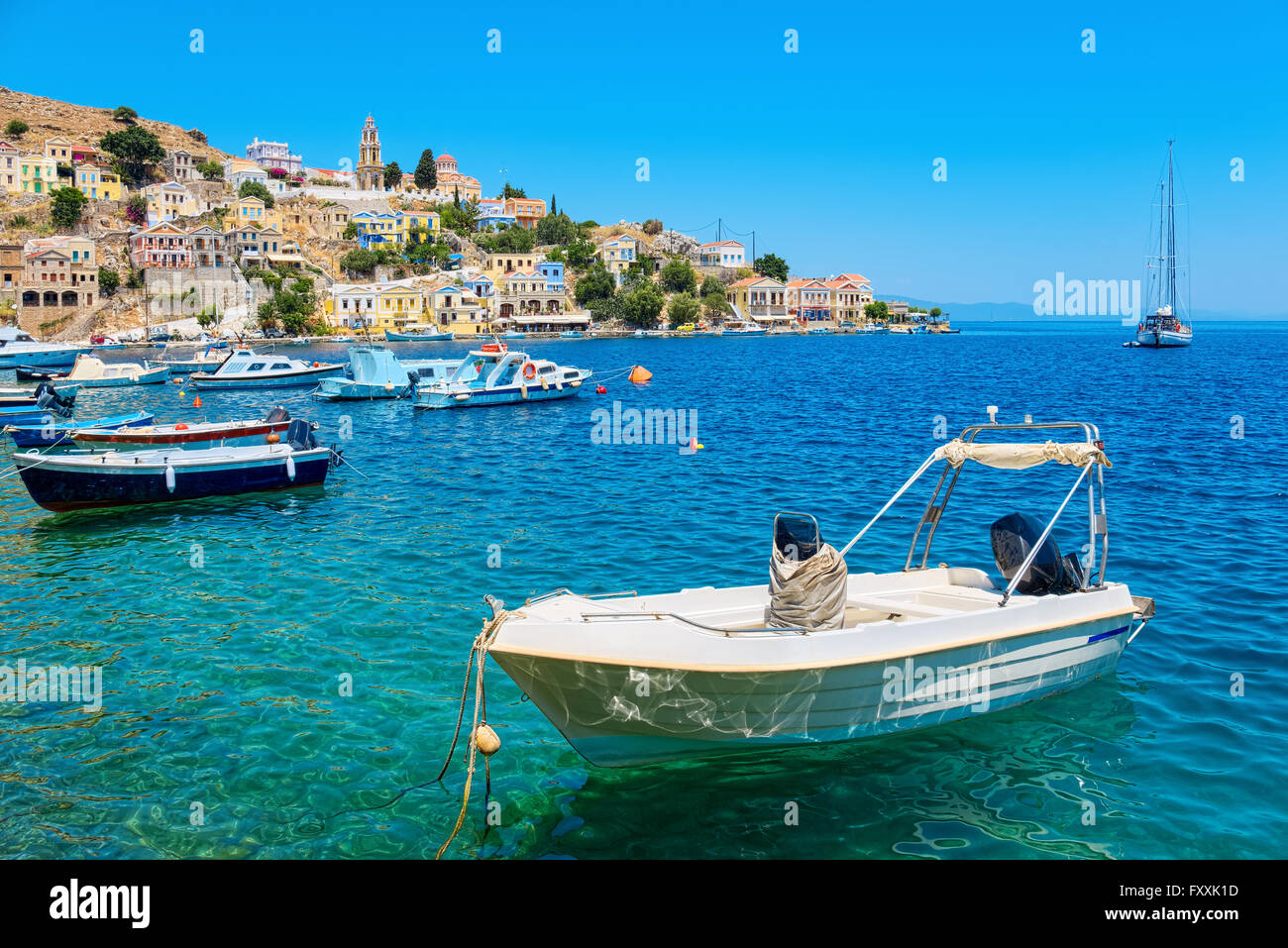 Fishing boats at the harbour of Symi. Dodecanese Islands, Greece, Europe Stock Photo