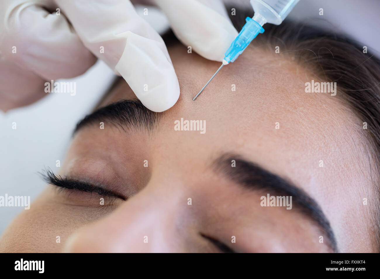 Woman receiving botox injection Stock Photo - Alamy
