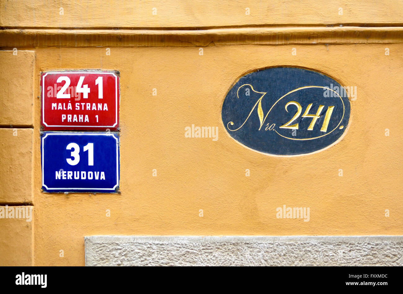 Prague, Czech Republic. House numbers in Nerudova (street) showing double house numbering system. Blue - street, red - district Stock Photo