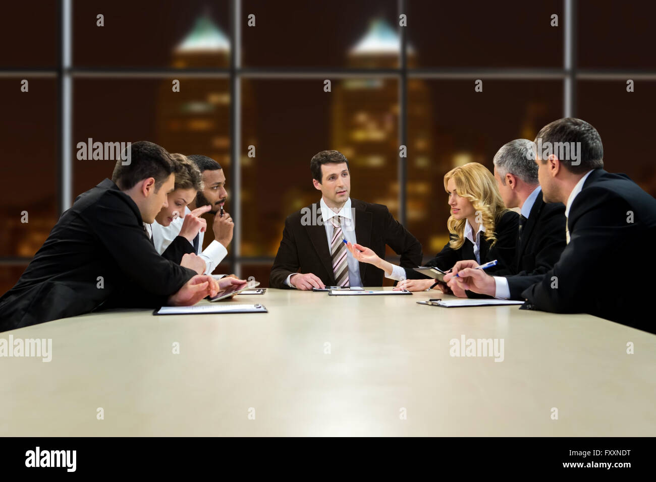 People in suits sit hi-res stock photography and images - Alamy