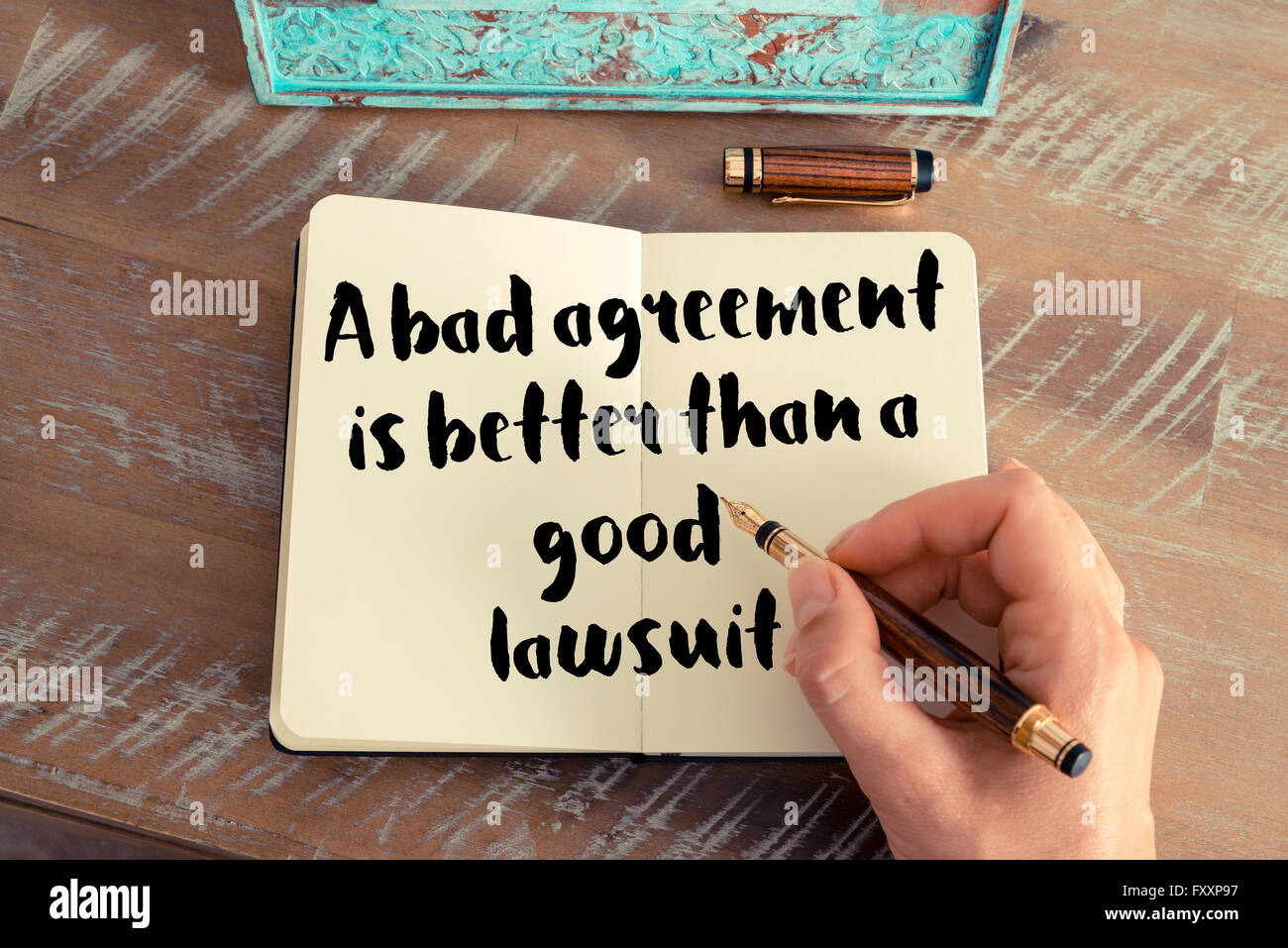 Handwritten quote A bad agreement is better than a good lawsuit as 