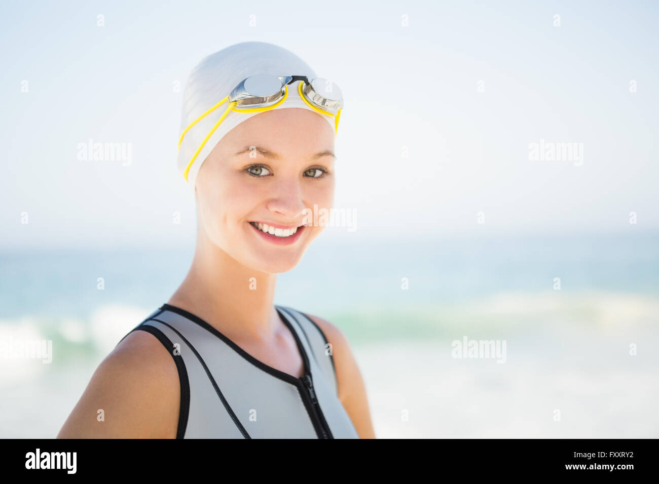 Portrait of smiling swimmer Stock Photo - Alamy