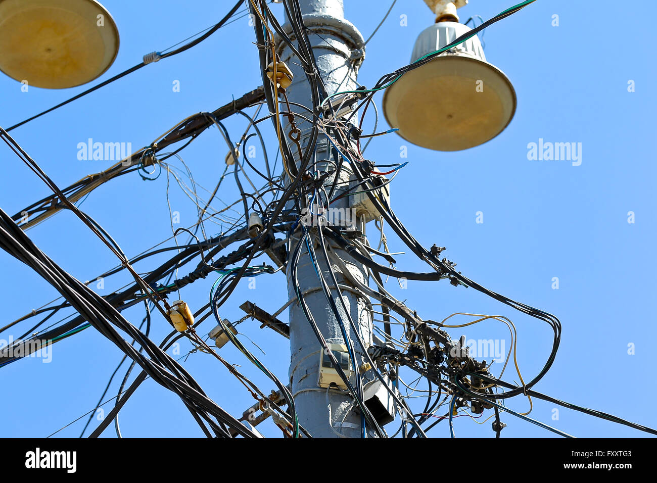 Switching electrical wires on concrete pillars Stock Photo Alamy