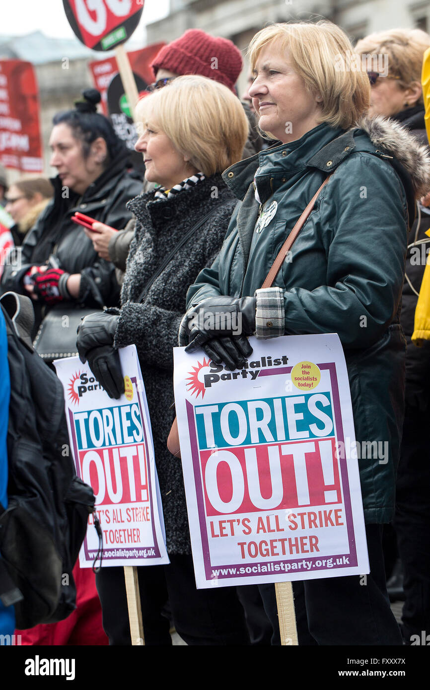 Two women, who look comfortably well off, attend a rally in London against the government austerity measures. Stock Photo