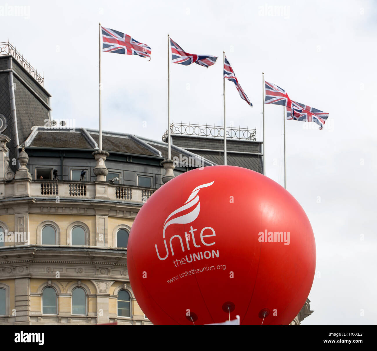 Balloons from the Unite Union against a backdrop of British Flags Stock Photo