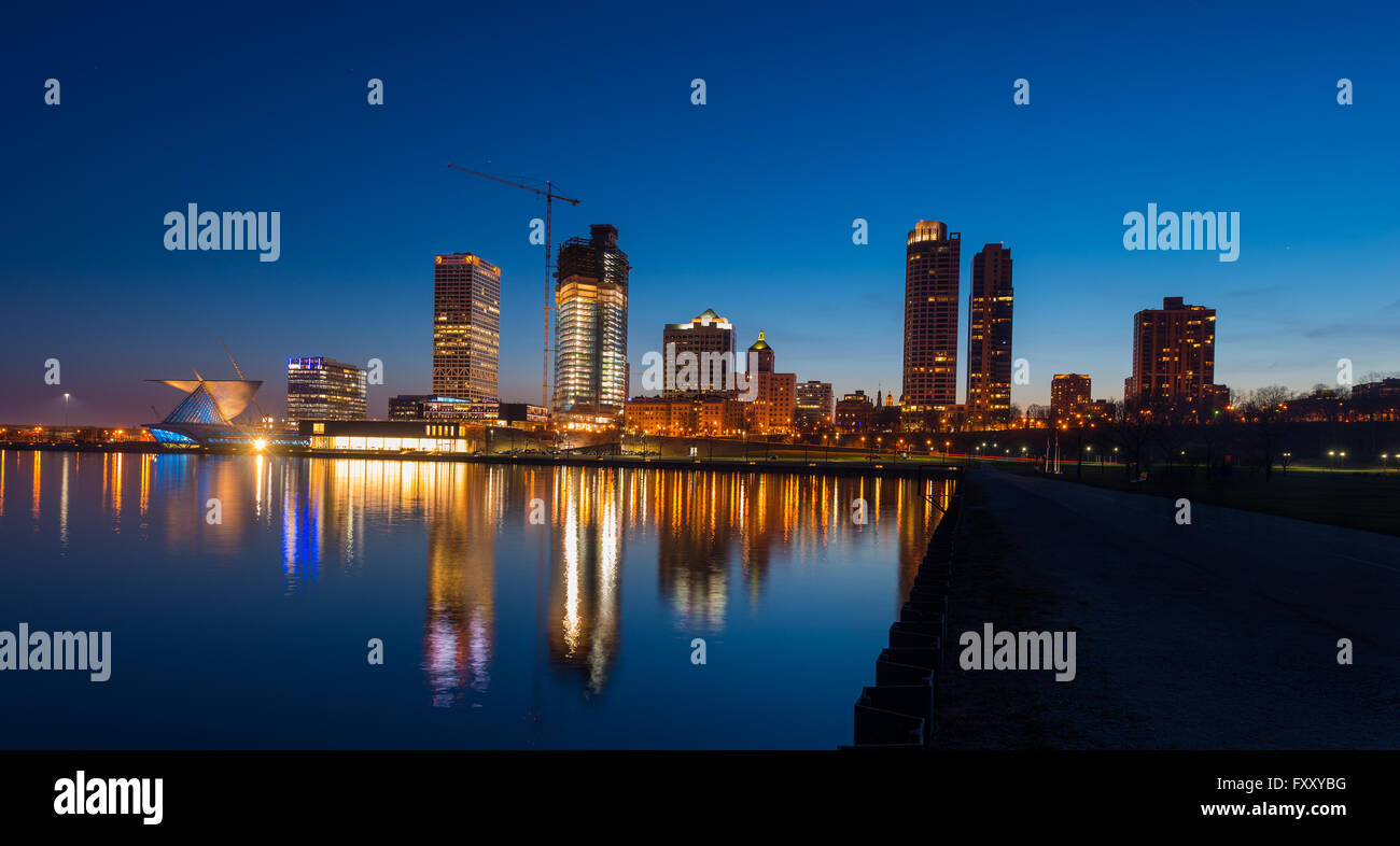 City of Milwaukee Wisconsin at Night lakefront ligts reflection in lake Michigan Stock Photo
