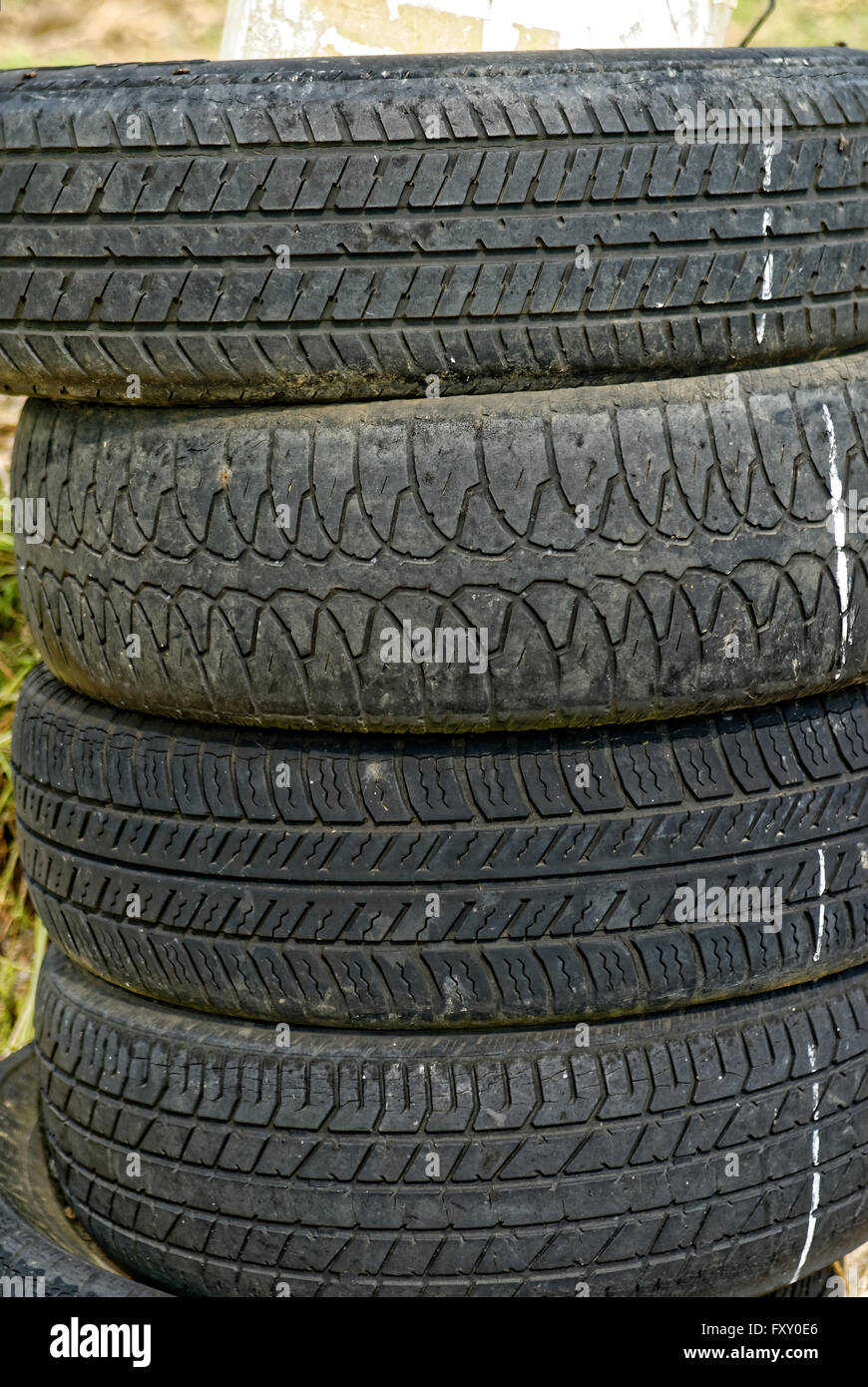 Pile of Old Used Car Tyres Stock Photo