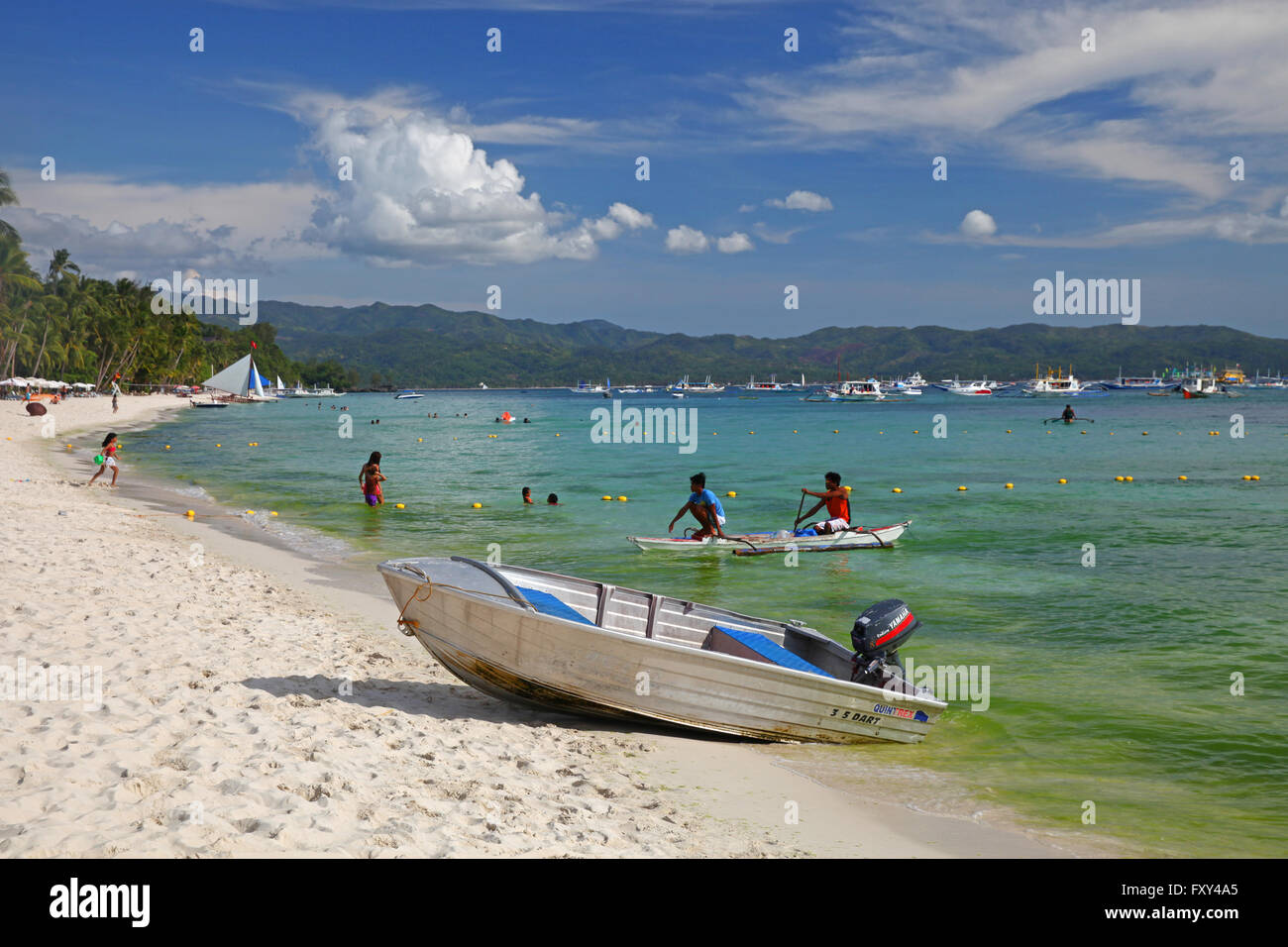 SMALL BOAT & CANOE ON WHITE BEACH BORACAY PHILIPPINES 28 April 2015 Stock Photo