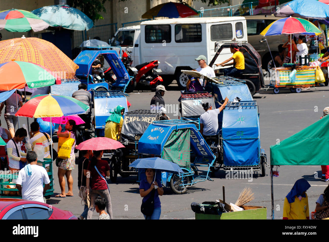 PEDAL TRIKES & PEDESTRIANS BACLARAN MANILA PHILIPPINES 05 May 2015 Stock Photo