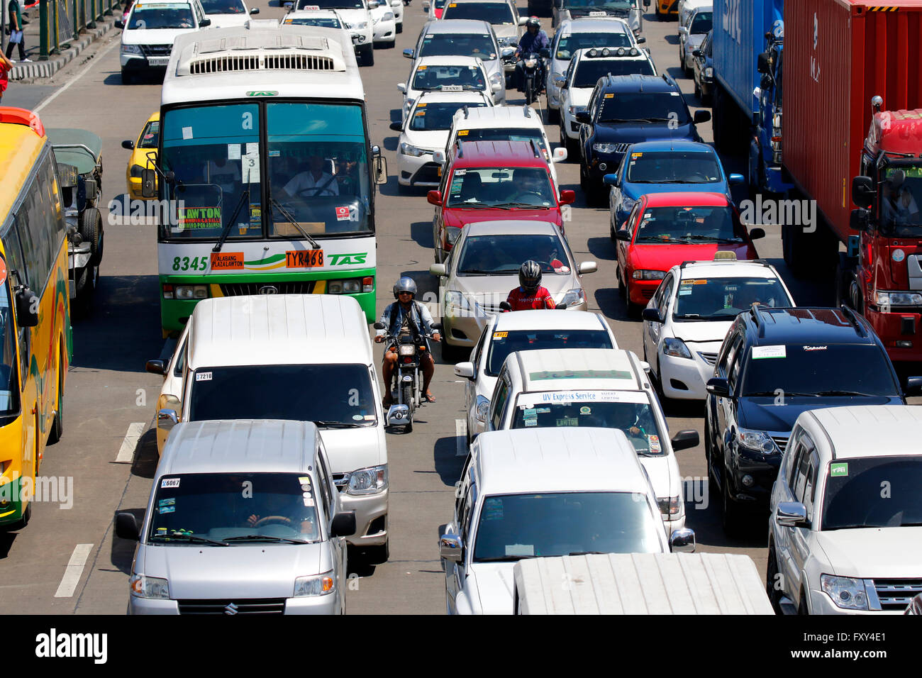 BUS & CARS IN TRAFFIC JAM BACLARAN MANILA PHILIPPINES 05 May 2015 Stock Photo